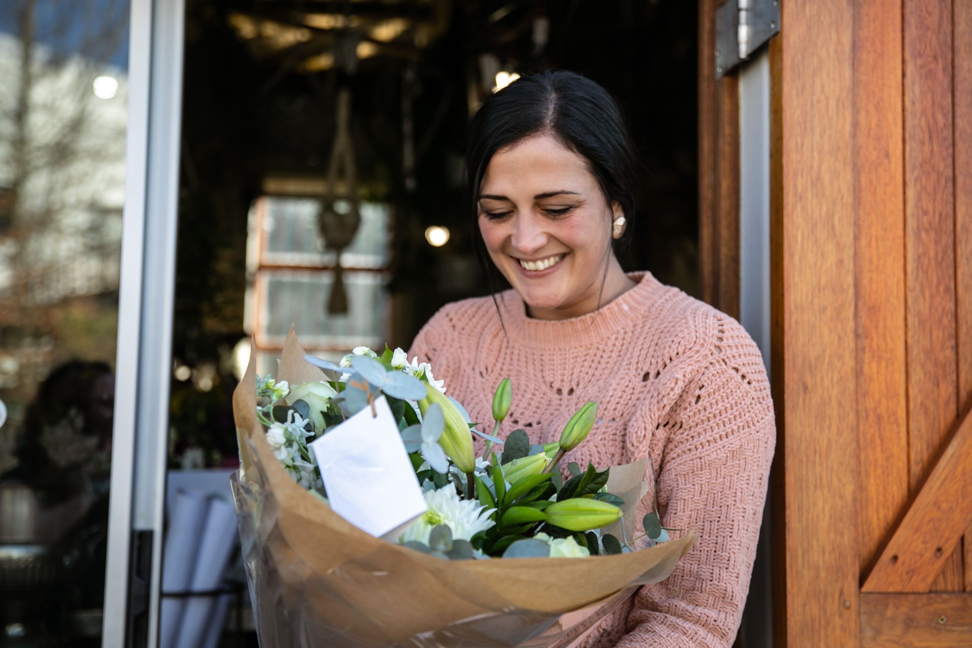 Happy Client Receiving a Flower Bouquet